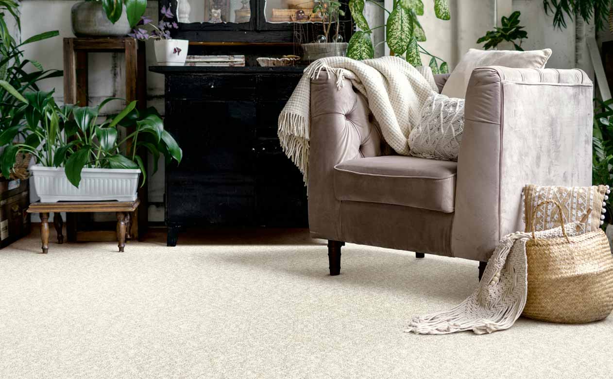 Living room with brown chair with beige carpet
